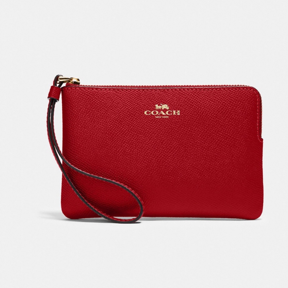 Coach red wristlet used once